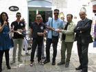 Il Presidente del Vespa Club Foggia Gargano al centro ritira una targa ricordo dal Sindaco di Ruvo di Puglia e da un Assessore